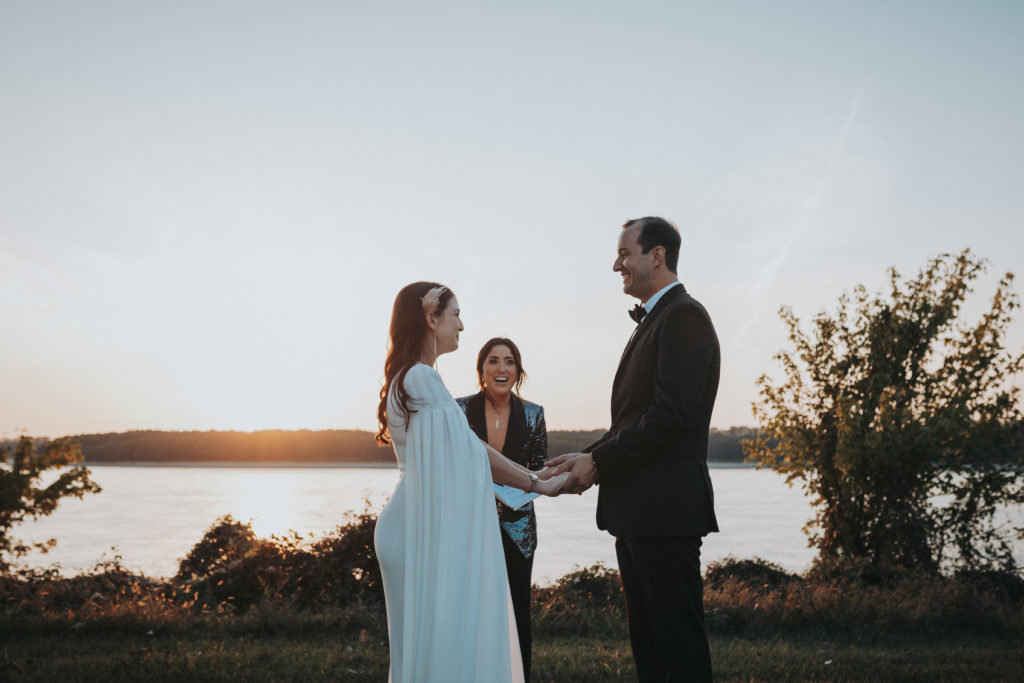 ceremony on the mississippi river, photographed by Wandering Creative in Memphis