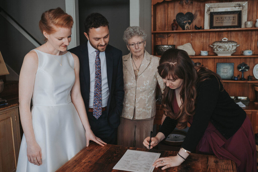 Marriage license signing after an intimate elopement in Midtown, Memphis.