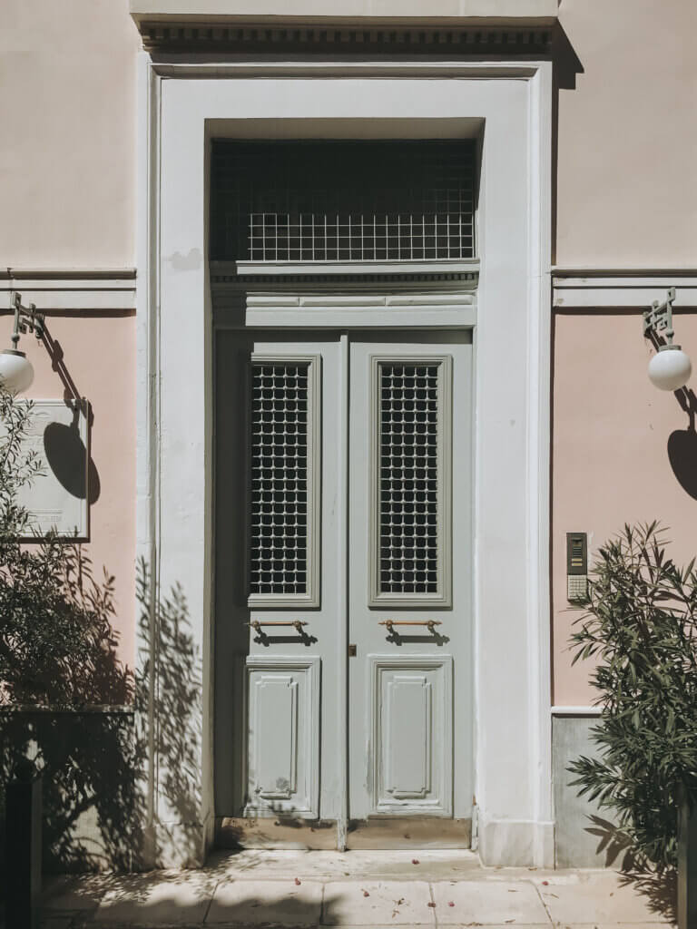 Set of doors on a beautiful building in the middle of Plaka, Athens, Greece.