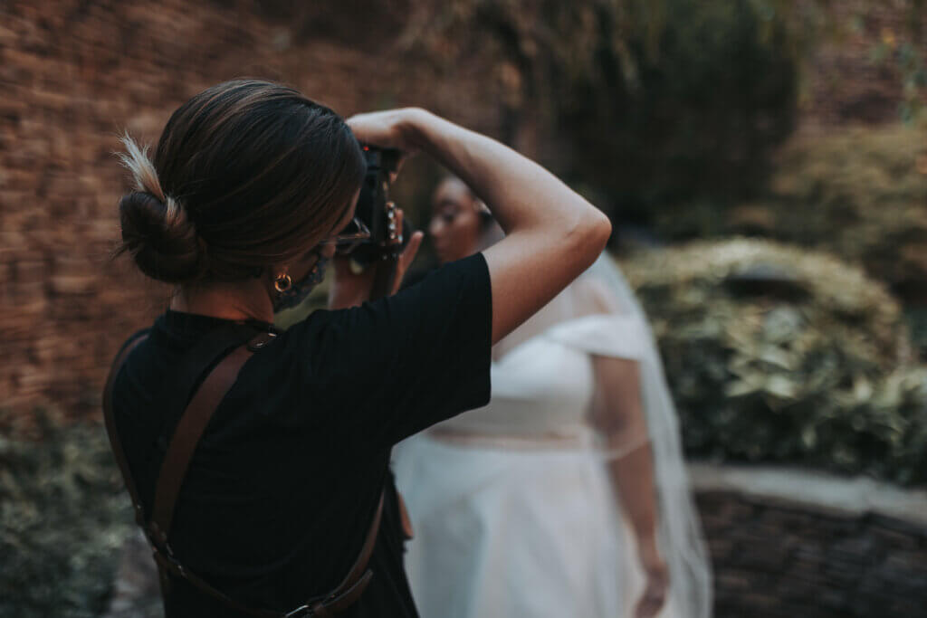 behind the scenes photo of Wandering Creative photographing bridal portraits in Memphis, TN