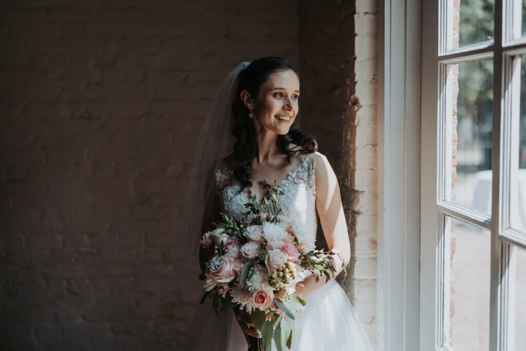 bride's portrait at the Woodruff Fontaine House, taken in the carriage house by Wandering Creative