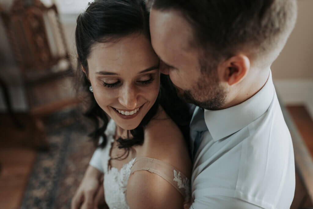 An intimate, close up wedding portrait of a couple in the tower of Woodruff Fontaine Museum, photographed by Wandering Creative, Memphis elopement photographer