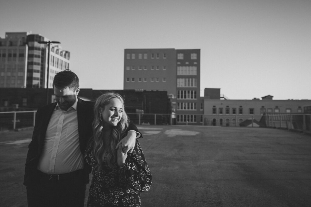 a couple walks along a rooftop together Chicago Elopement Venues