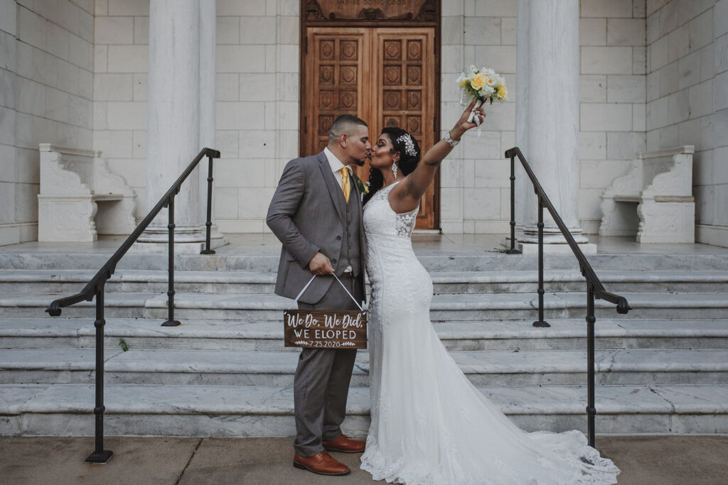 a couple secretly elopes on the steps of the Brooks Museum in Memphis. Elopement Wedding Ideas
