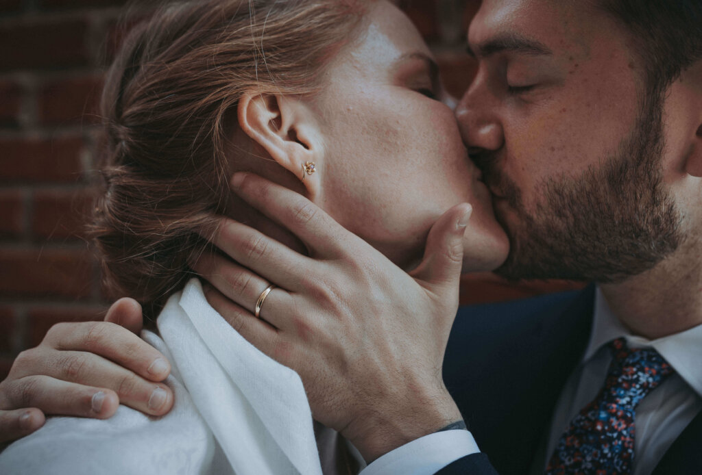 a couple kisses during elopement portraits.