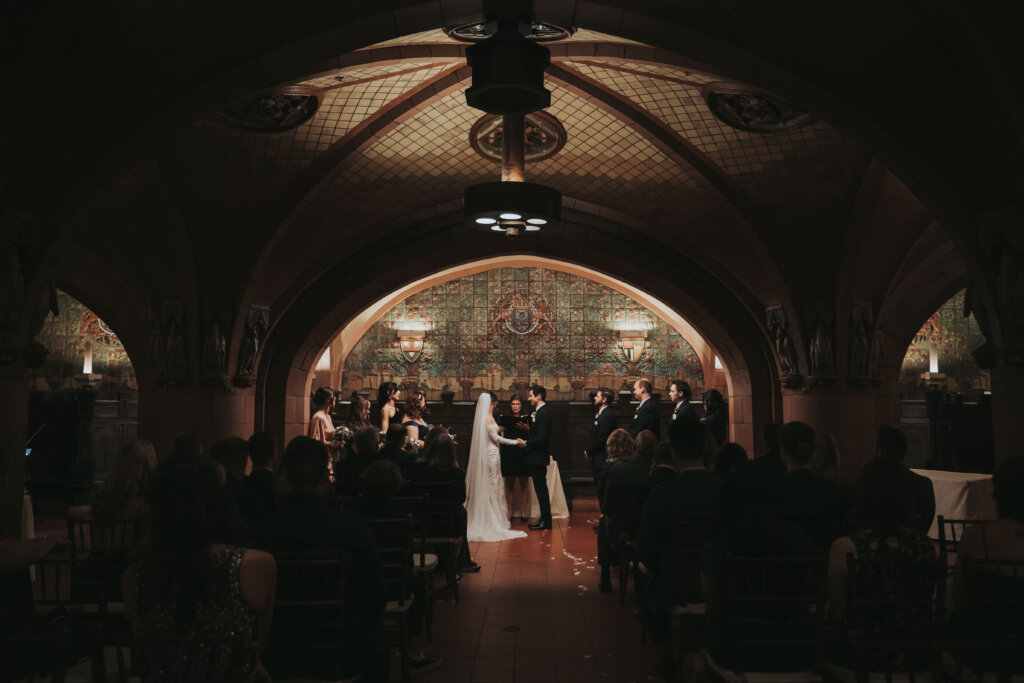An intimate ceremony in the moody and romantically lit Rathskeller Room at the Seelbach Hotel in Louisville, KY.